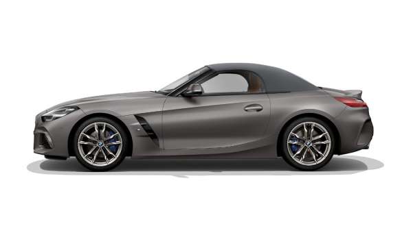 BMW Z4 M40i, G29, cu soft-top-ul închis Imagine cu partea laterală a BMW Z4 M40i, G29, 2019, în Gri Frozen metalizat de la BMW Individual, cu pachet M Aerodinamic
