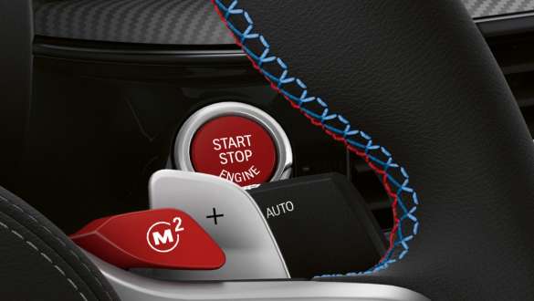 Butonul Start/Stop roşu al BMW M5 Competition Imagine din habitaclu cu butonul Start/Stop roşu al BMW M5 Competition