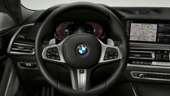 BMW X6 M50i şi M50d cu volan M îmbrăcat în piele Imagine cu habitaclul BMW X6 M50i şi M50d, G06 SUV, cu volan M îmbrăcat în piele