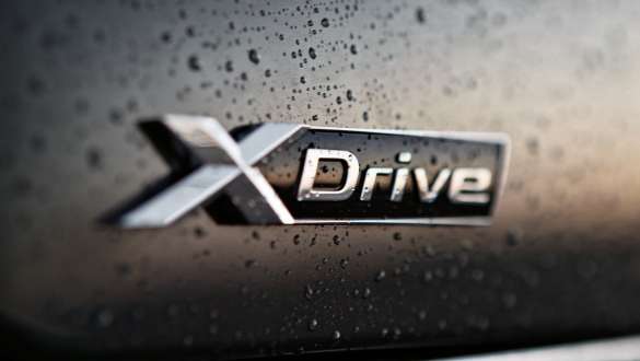 BMW X6 M50i cu BMW xDrive Imagine cu partea spate a BMW X6 M50i, G06, cu BMW xDrive