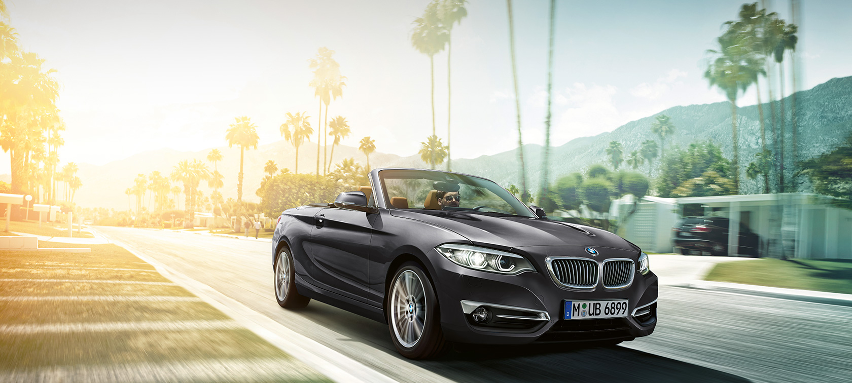 Imagine cu BMW Seria 2 Cabriolet rulând