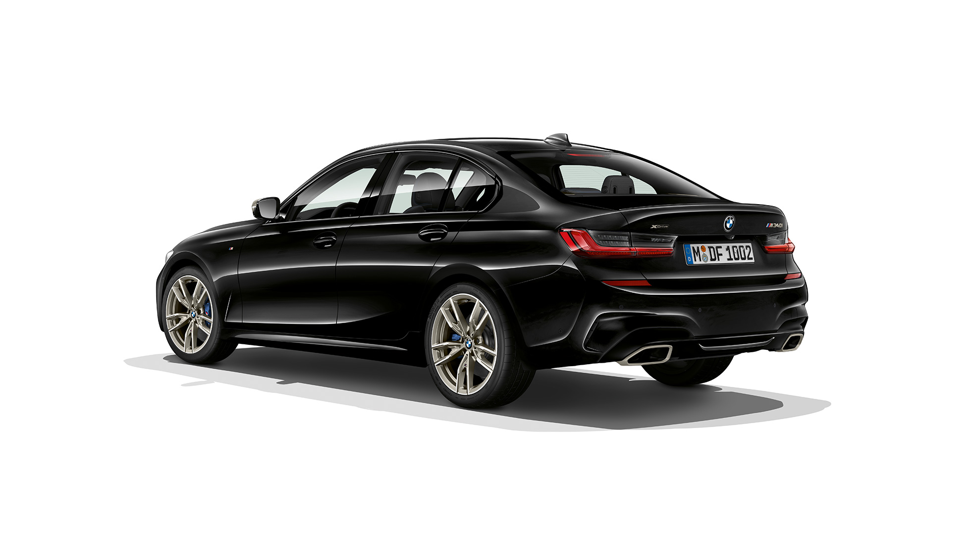 Partea spate M340i xDrive, BMW Seria 3 Sedan. Imagine cu trei sferturi din spate a BMW Seria 3 M340i xDrive Sedan.