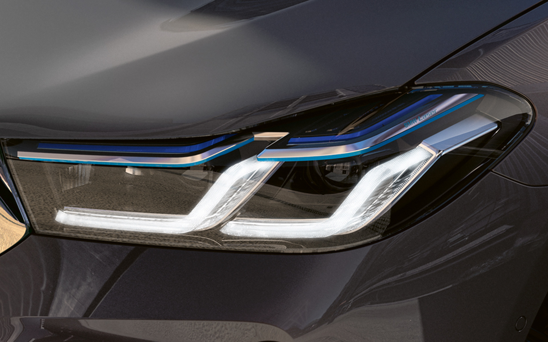 Imagine în prim plan cu farurile BMW Laserlight ale BMW Seria 6 Gran Turismo 640i xDrive, G32, 2020, în Gri Bernina