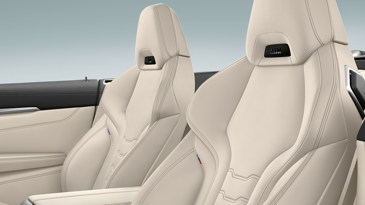 Imagine a BMW M850i xDrive cu scaune multifuncţionale din piele Merino în Alb Ivory şi sistem de încălzire integrat în tetiere. Imagine a BMW M850i xDrive cu scaune multifuncţionale din piele Merino în Alb Ivory şi sistem de încălzire integrat în tetiere.