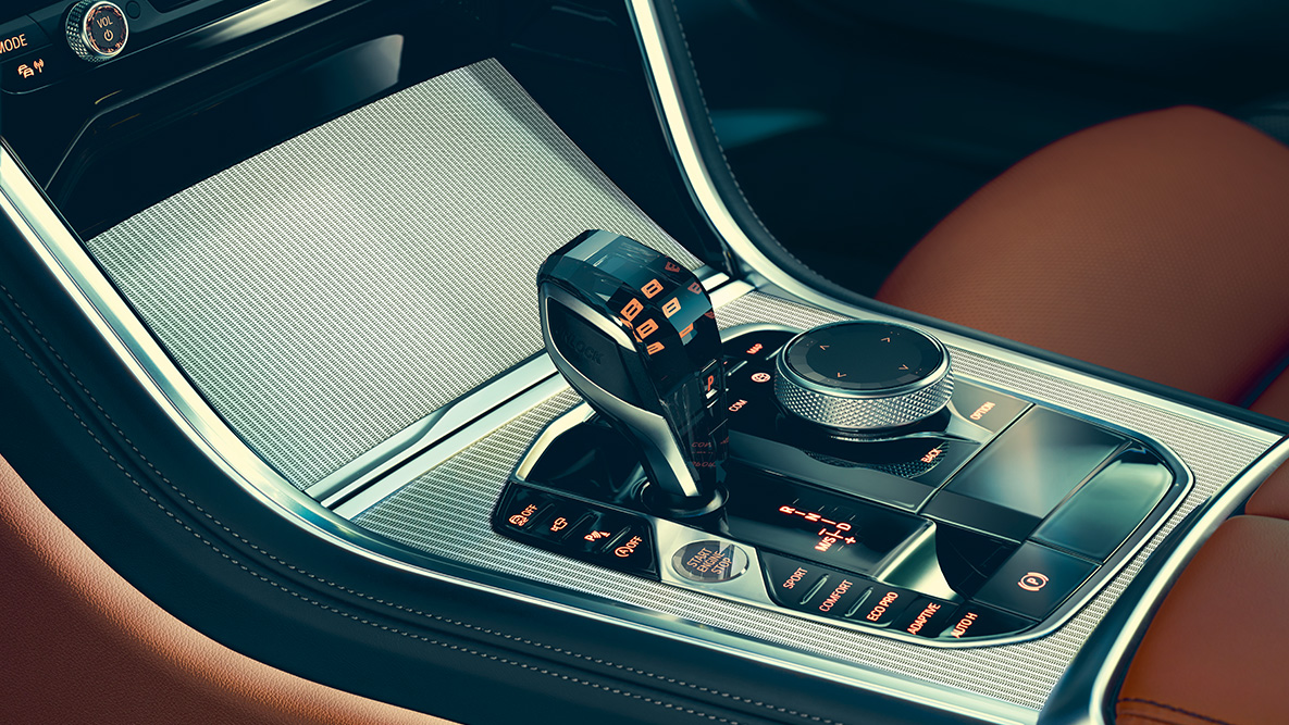 Aplicaţiile din sticlă ale BMW Seria 8 Coupé. Imagine în prim-plan cu aplicaţiile din sticlă din interiorul BMW Seria 8 Coupé.