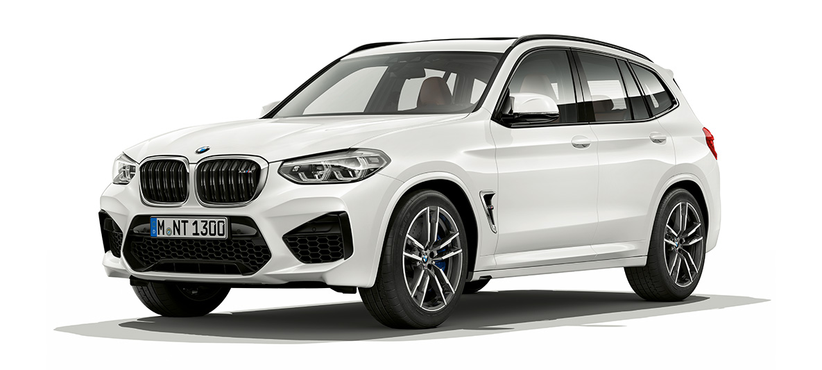 Imagine cu trei sferturi din partea laterală a BMW X3 M. Imagine cu trei sferturi din partea laterală a BMW X3 M în Alb Alpine.