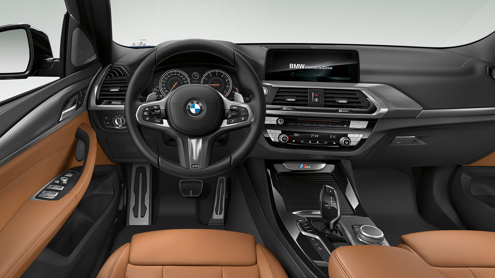 Habitaclul BMW X3 M40i şi BMW X3 M40d. Habitaclul BMW X3 M40i şi BMW X3 M40d, cu volan M îmbrăcat în piele şi scaune M Sport.