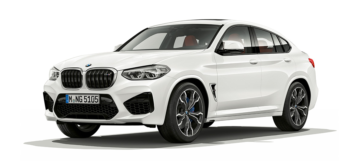 Imagine cu trei sferturi din partea laterală a BMW X4 M. Imagine cu trei sferturi din partea laterală a BMW X4 M în Alb Alpine.