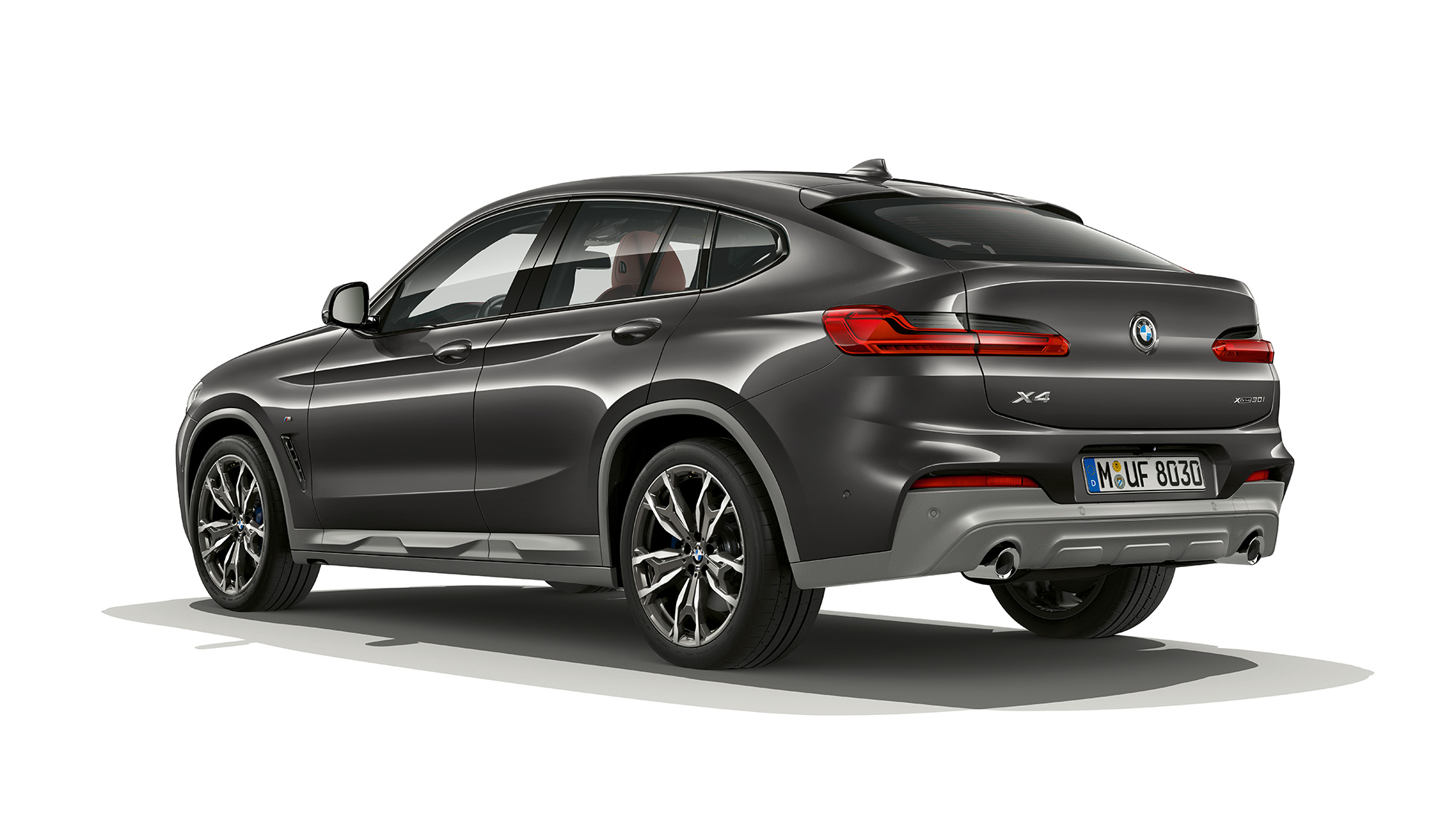 Imagine cu trei sferturi din partea spate a BMW X4, cu pachet M Sport X Imagine cu trei sferturi din partea spate a BMW X4 xDrive30i, G02, 2018, în Gri Sophisto Brilliant Effect, cu pachet M Sport X