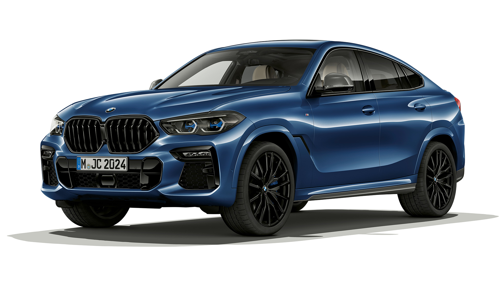 Imagine de la exterior a modelului BMW X6 cu pachet M Sport, Imagine cu trei sferturi din partea frontală a modelului BMW X6 cu pachet M Sport