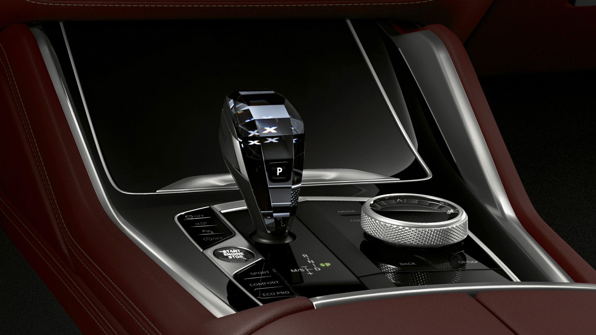 Consola centrală a modelului BMW X6 cu pachet BMW Individual. Imagine în prim-plan cu consola centrală a BMW X6 cu pachet BMW Individual.