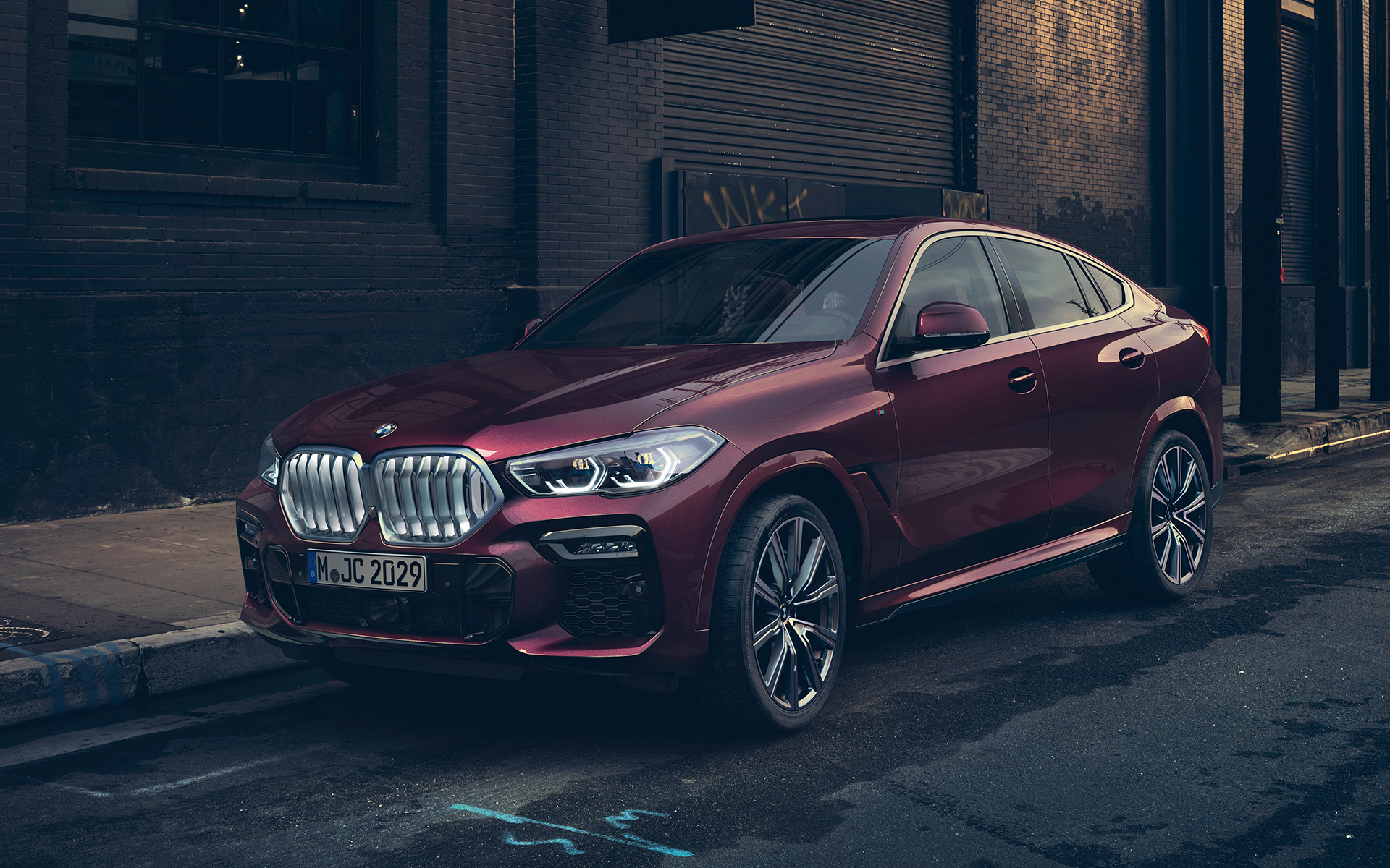 Imagine cu trei sferturi din partea frontală a BMW X6 G06 2019 Individual Imagine cu trei sferturi din partea frontală a BMW X6 G06 2019 Ametrine Individual