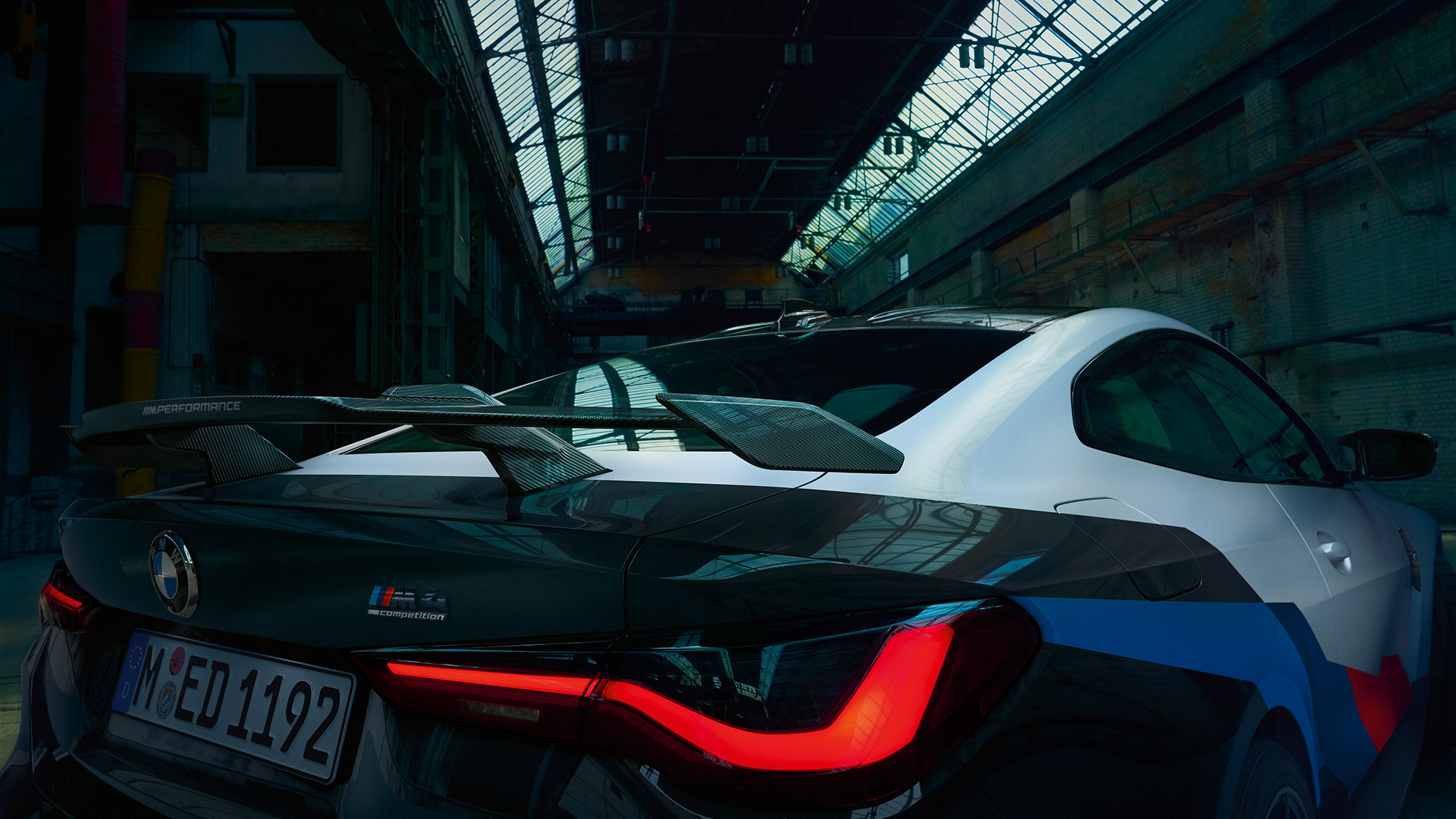 Imagine în prim plan din spate cu BMW M4 G82 Imagine în prim plan din spate cu BMW M4 G82, cu accesorii BMW M Performance